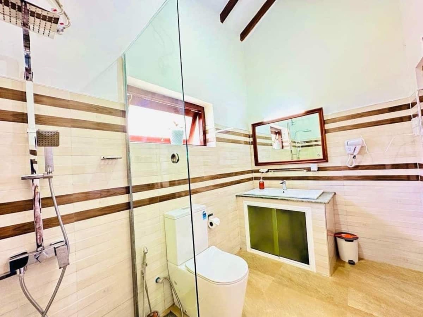 Modern bathroom with glass rain shower