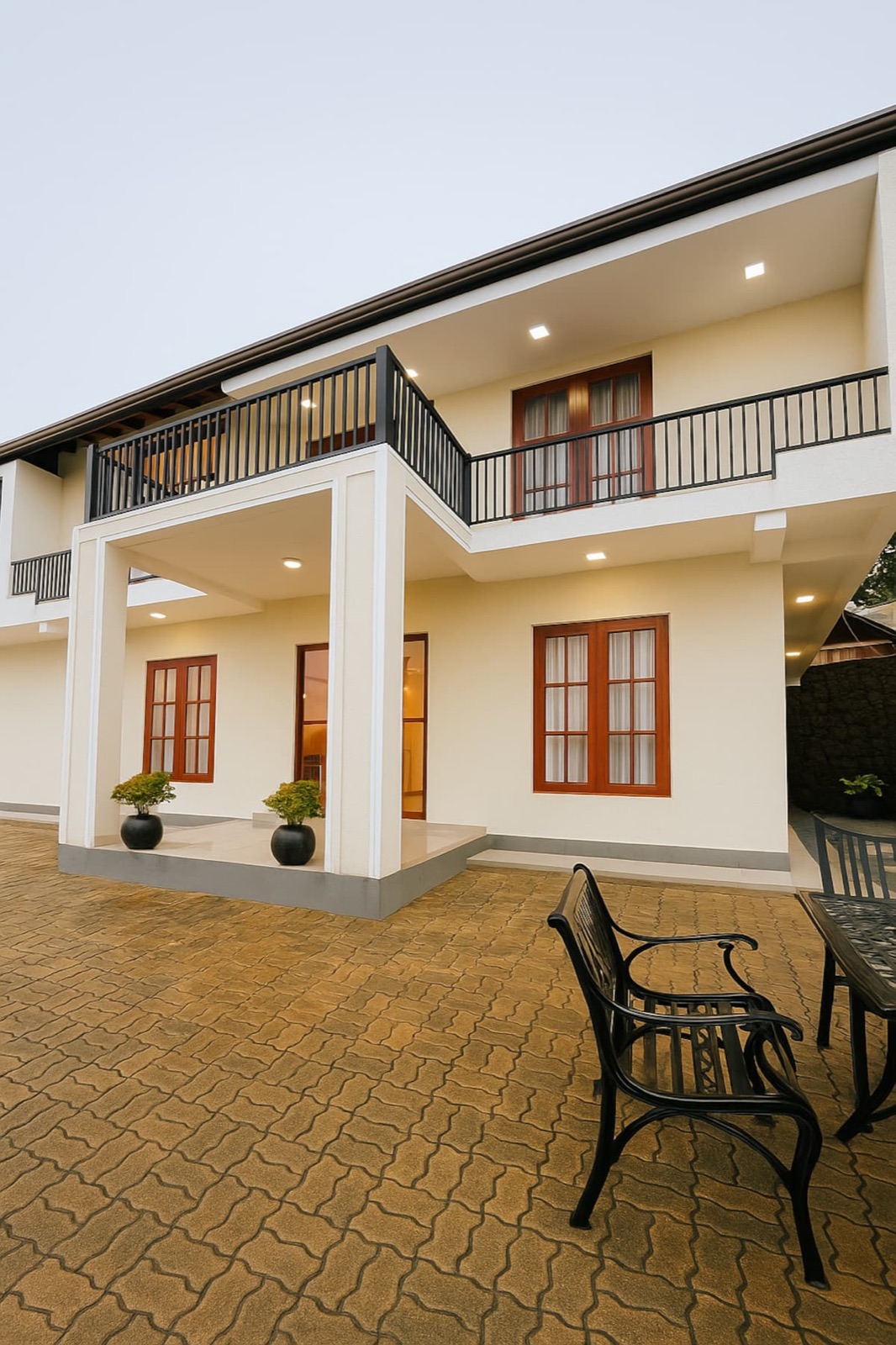 Front of Bloomingdale Bungalows with covered porch and teak windows