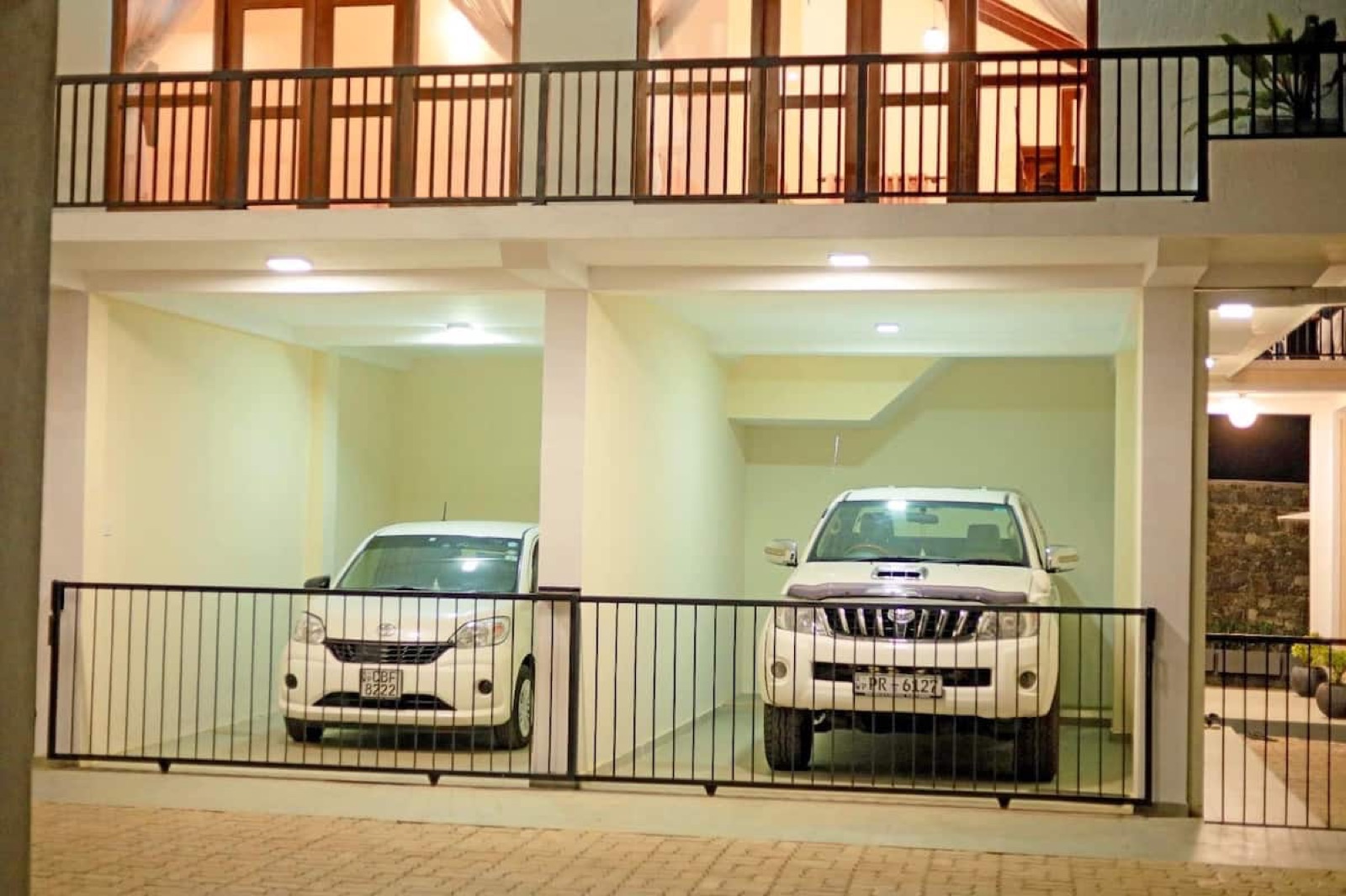 Covered garage with two vehicles